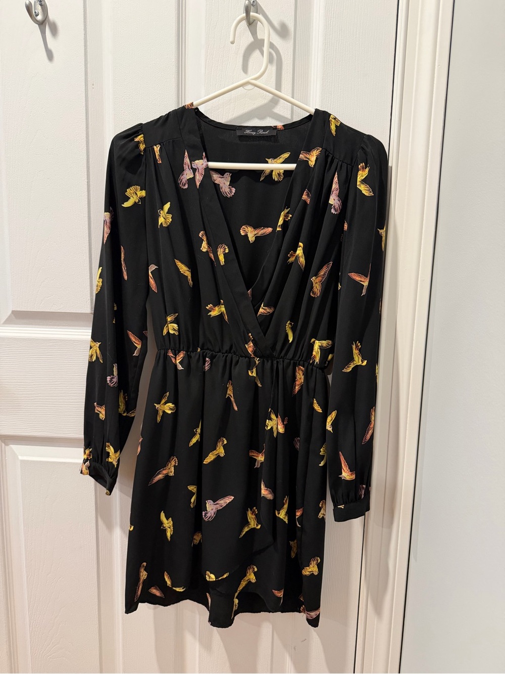 Black dress with bird print